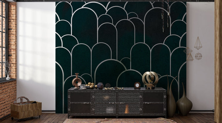 Deep moody dark green mural wallpaper in a dimly lit dining room