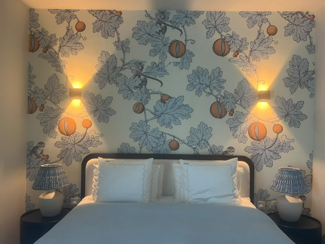Custom hand-designed botanical mural with monkeys installed above the bed, Jumeirah 2 villa, by La Belle Maison